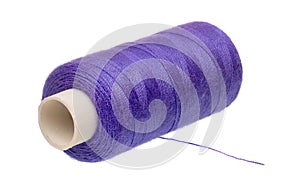 Spool of blue thread isolated on white background