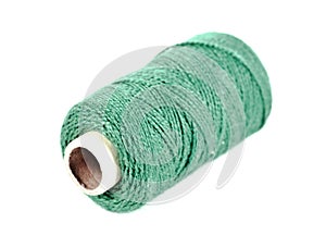 A spool of green thread