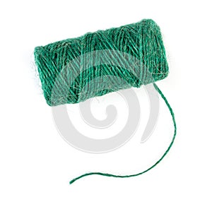 Spool of natural green linen twine, isolated on white background, top view