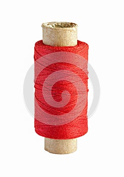 Spool with red thread isolated on white