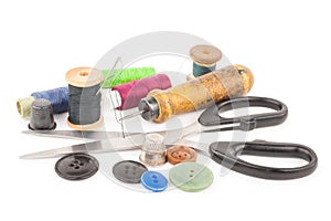 Spool of thread with buttons and scissors