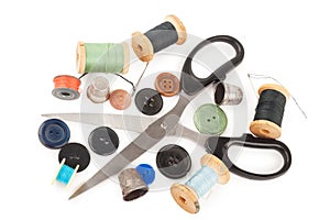 Spool of thread with buttons and scissors