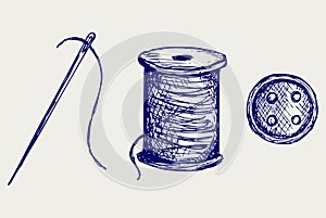 Spool with threads and sewing button