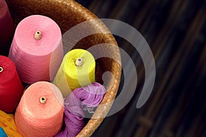 Spools of colored silk thread for woven silk cloth