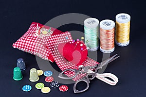 Spools, Neddle Case, Scissors, Buttons and Thimbles