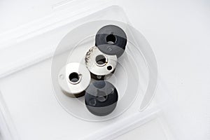 Spools for sewing machines. A spool of thread
