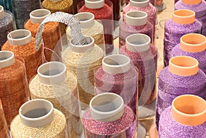spools of thread with rhinestones on sale in English haberdasher