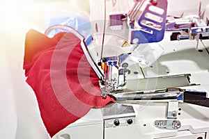 Spools of thread and sewing coverstitch machine