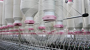 Spools of thread at a textile factory