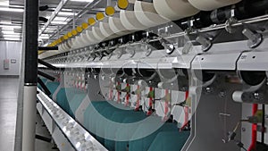 Spools of thread at a textile factory