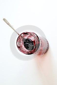 Spoon with berry jam.