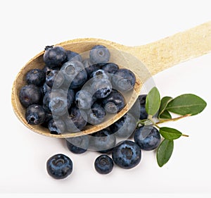 Spoon with blueberries