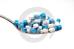 Spoon and capsulas medicas