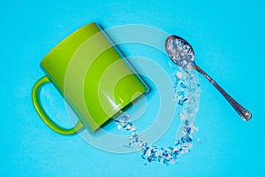 Spoon and cup with microplastics