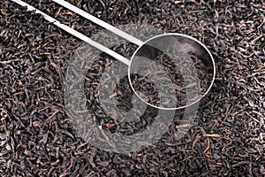 Spoon and dried tea leaves