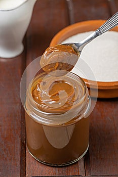 Spoon with Dulce de leche, traditional sweet from Argentina