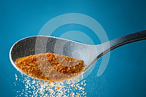 Spoon with a food ingredient grain