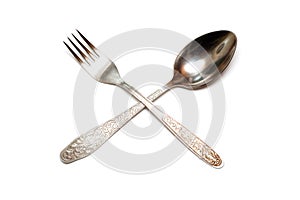 Spoon and fork a crosswise photo