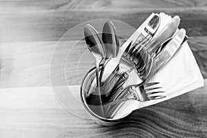 Spoon fork and knife on table view from above