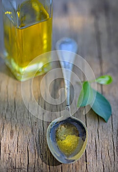 Spoon full of olive oil