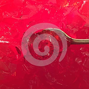 Spoon full red jello