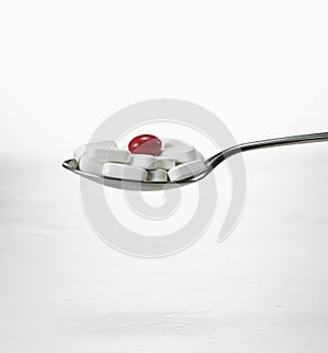 Spoon full of tablets