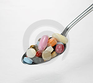 Spoon full of tablets