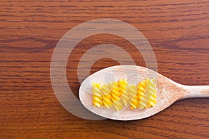 Spoon with fusilli macaroni