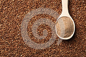 Spoon of gluten free flour on buckwheat