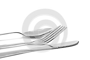 Spoon, knife and fork. flatware on white photo