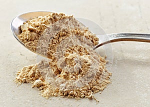 Spoon of maca powder