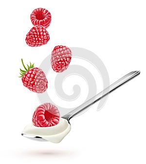 Spoon with natural yogurt and falling raspberries isolated on white