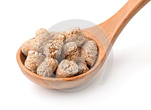 Spoon with oats bran pellets