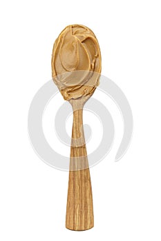 Spoon with organic peanut butter