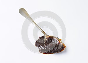 Spoon of plum jam