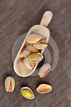 Spoon of raw pistachio nuts