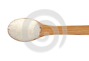 Spoon with sugar on a white background.