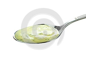 A spoonful of creamy sauce