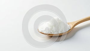 Spoonful of white sugar against white backdrop, sugar, background