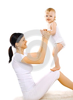 Sport, active, leisure and family concept - happy mom and baby