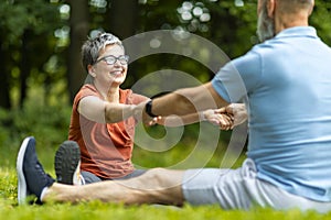 Sport Activities For Seniors. Portrait Of Older Couple Training Together Outdoors