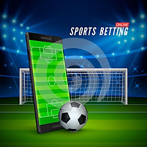 Sport betting online. Mobile phone with soccer field on screen and realistik football ball in front. Soccer stadium on background