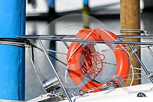 sport boat railing orange life ring safety