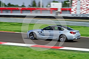 Sport car fast moving on track