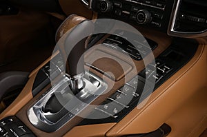 Sport car interior background. Automatic transmission in modern luxury car