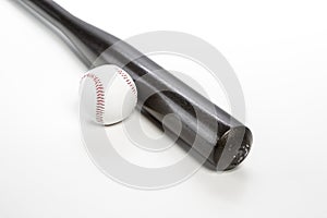 Sport Concepts. Closeup of Brown Wooden Baseball American Bat Along With Leather Ball Placed Together Over White Background