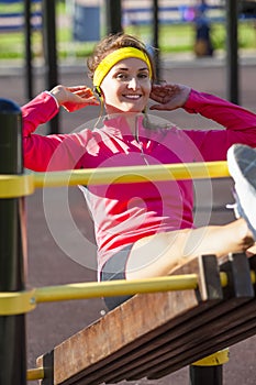 Sport Concepts. Happy Smiling Sportive Caucasian Girl in Outdoor Outfit