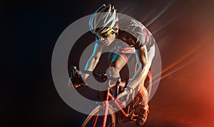 Sport. Cyclist carry a bike on dramatic background.