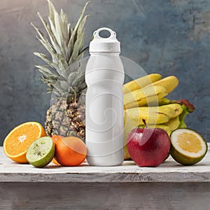 Sport drink bottle mockup with fruits on table, kitchen background