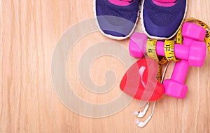 Sport Equipment for Cardio. Sneakers, dumbbells, measuring tape